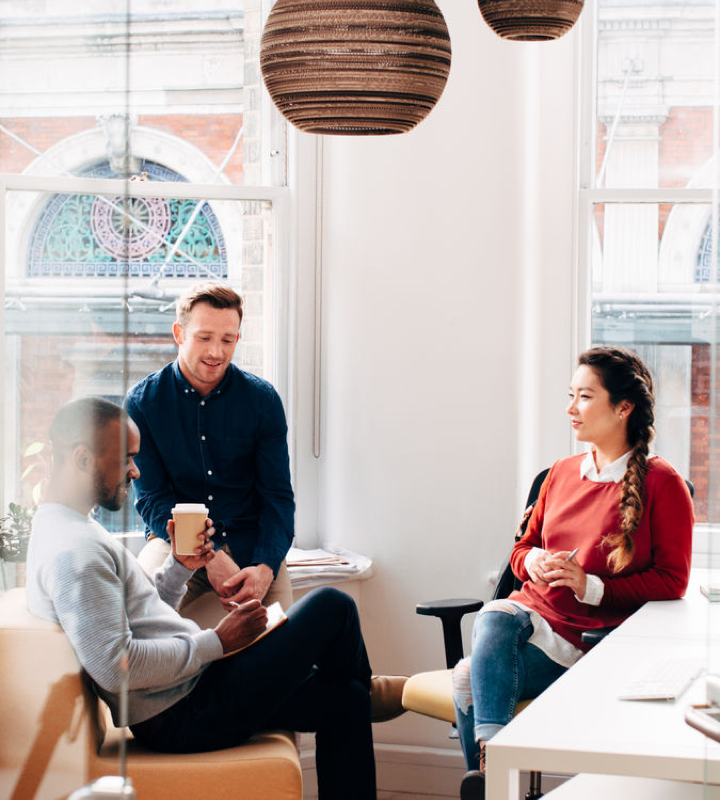 A group of people talking about books while having coffee